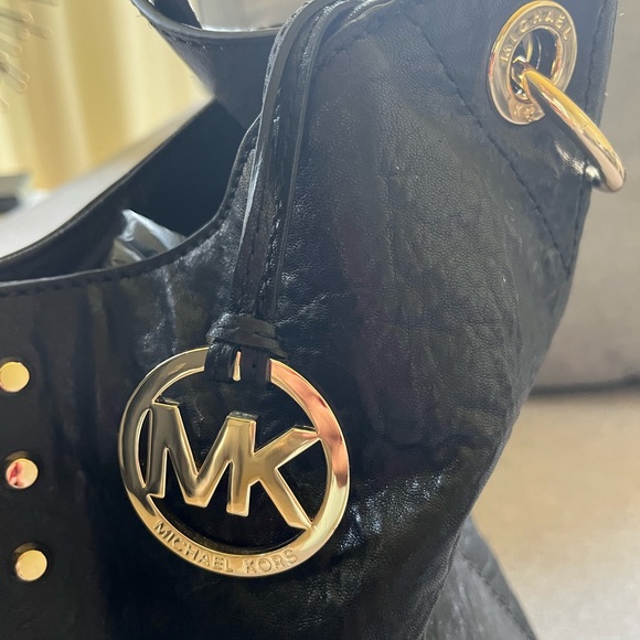Beautiful leather MK bag in like new condition w dust bag. Stylish/unique look. - Picture 2 of 4